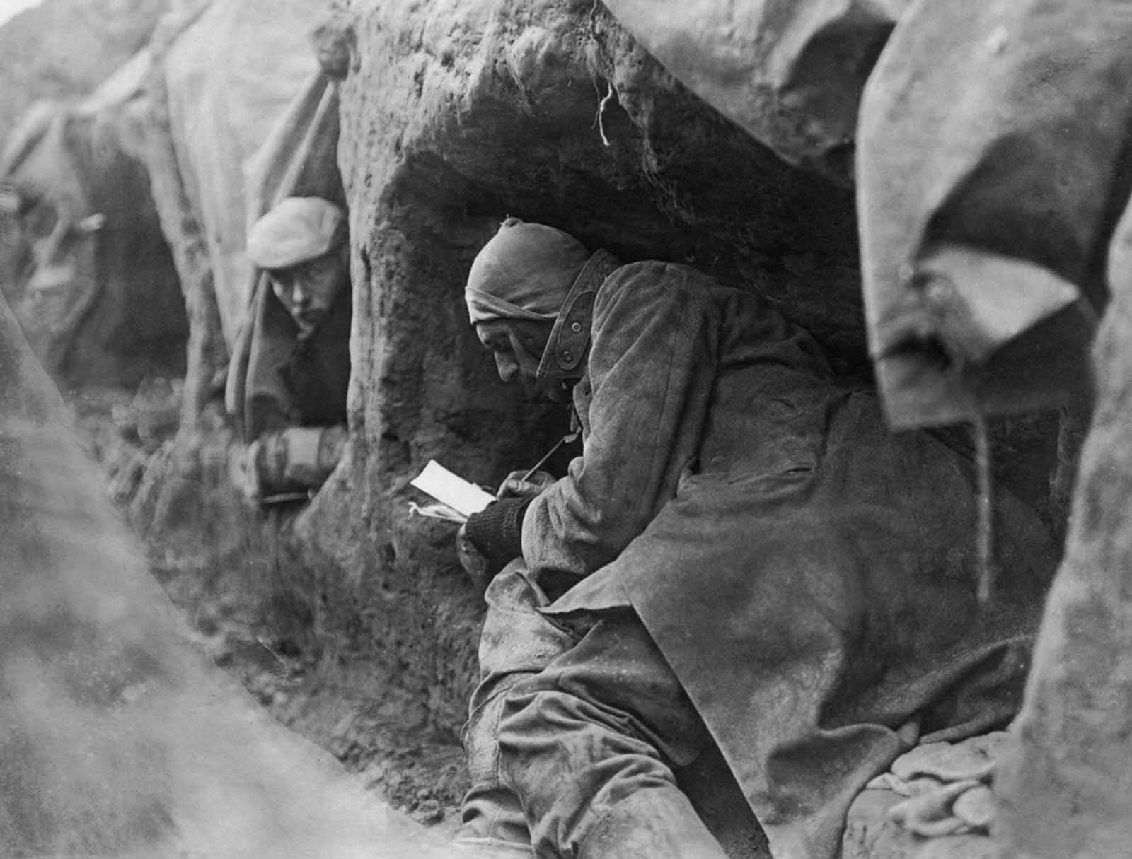 Soldiers in trenches during write letters home. Life in the trenches was summed up by the phrase which later became well-known: 