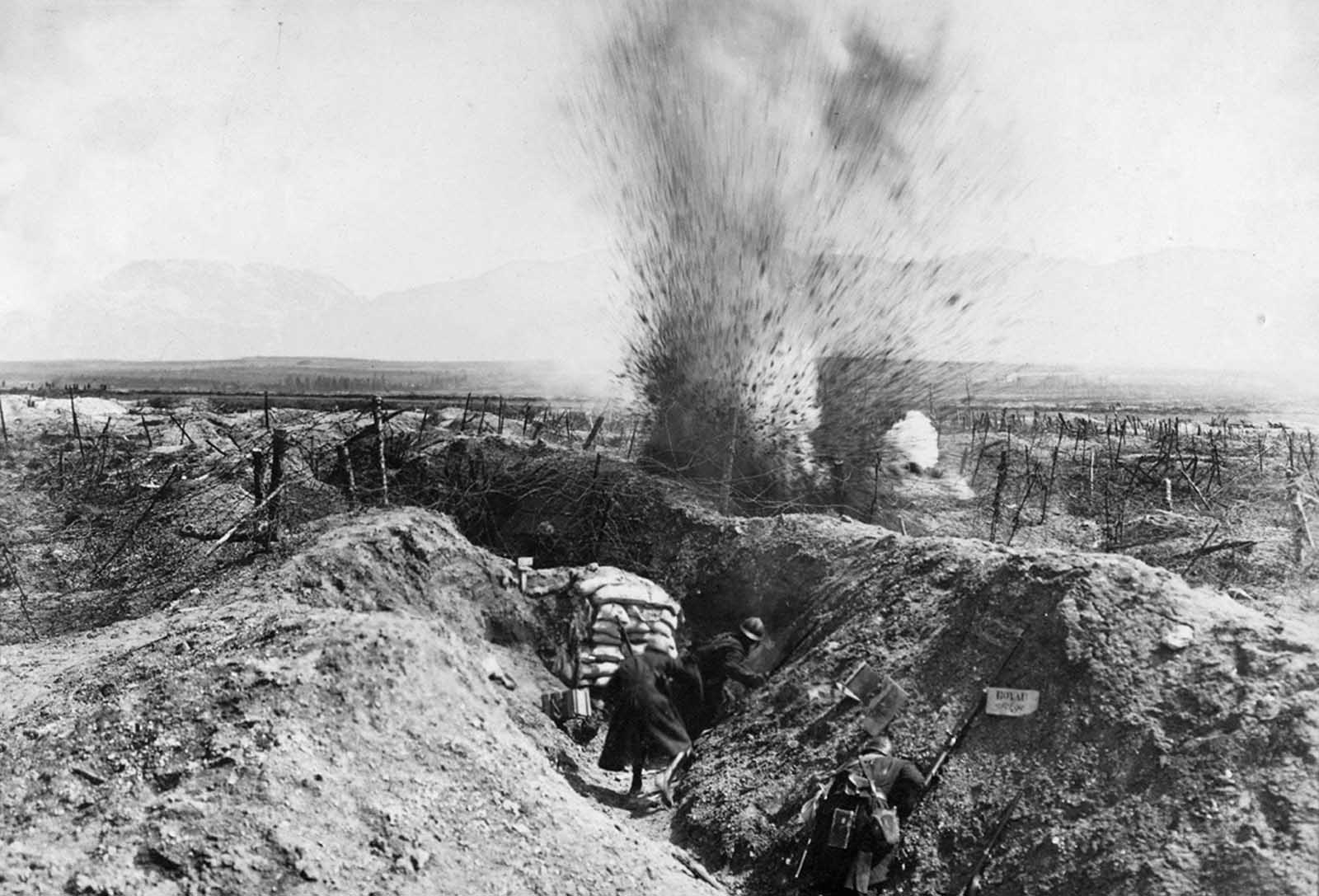 An explosion near trenches dug into the grounds of Fort de la Pompelle, near Reims, France.